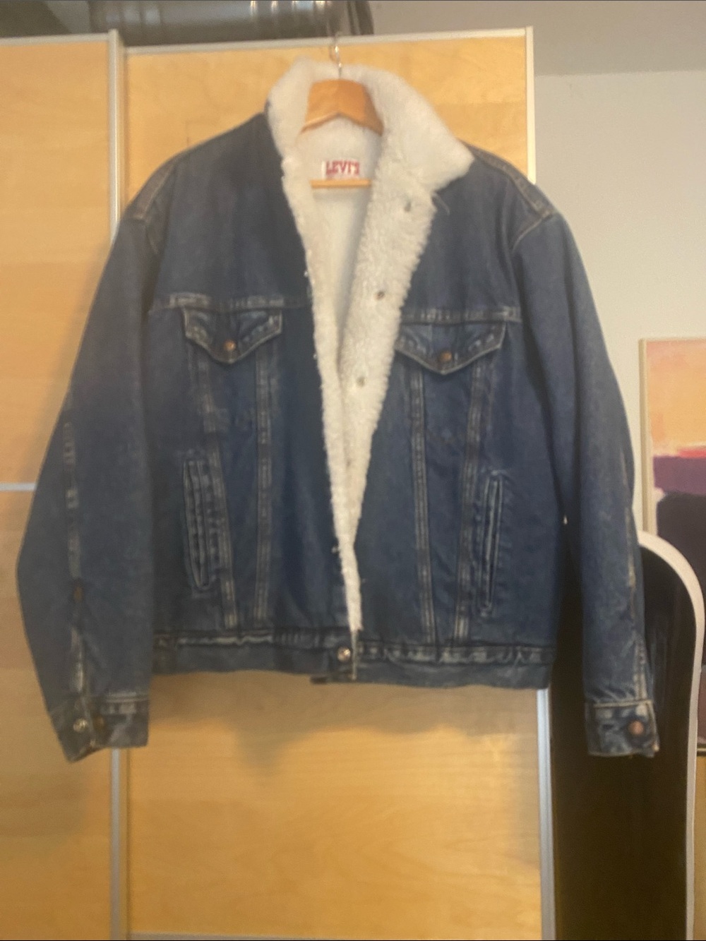 Vintage Levi's Blue Denim Jacket with White Sherpa Lining made in USA .